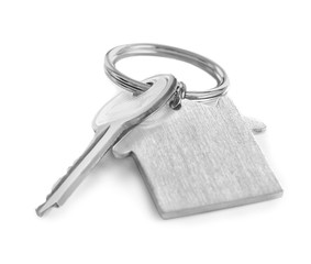 Key with trinket on white background. Insurance broker concept