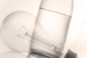 abstract soft focus still life with bottle and electric lamp