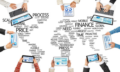 Top view of businesspeople sitting at table and using gadgets