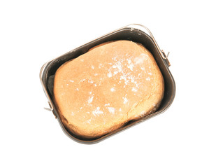 Baking pan with fresh homemade bread on white background