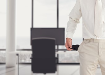 Fototapeta premium man with white suit and with empty pockets in the office