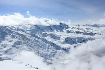 Fototapeta premium The view from the Rothorn (3,103 m) showcases the highest peaks of the Swiss Alps. Valais, Switzerland.