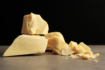 Pieces of cocoa butter on table