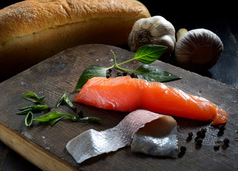 fresh  salmon on wooden cutting board