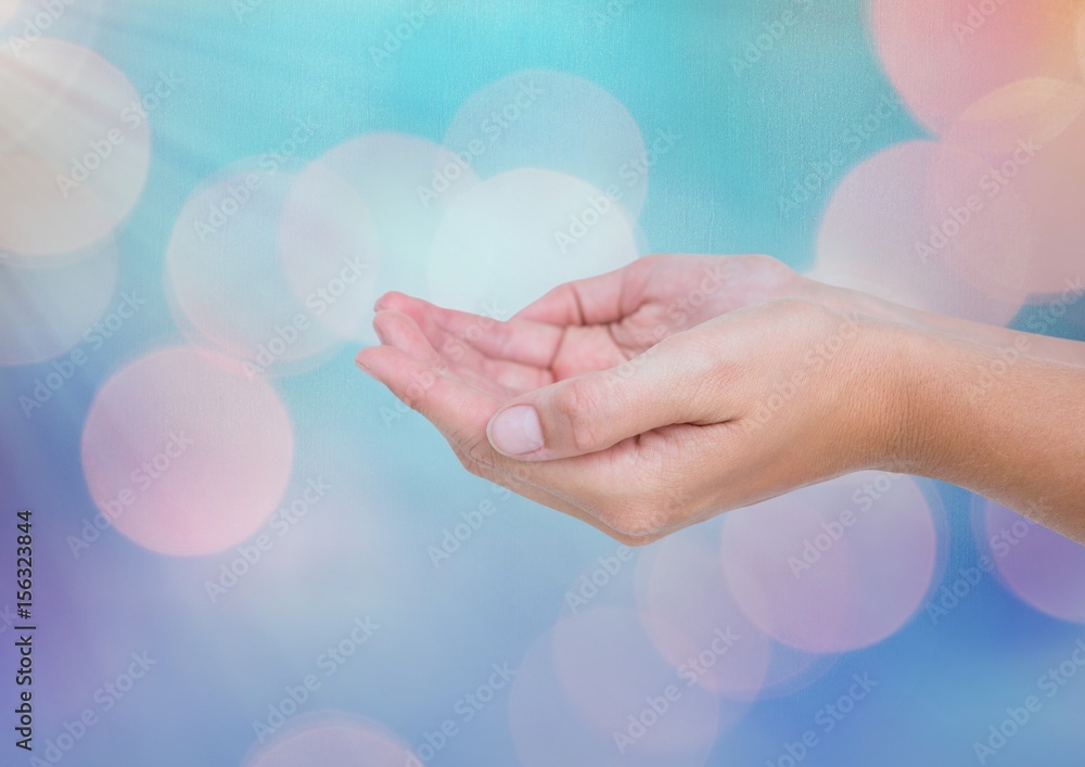 Poster hands open with sparkling light bokeh background