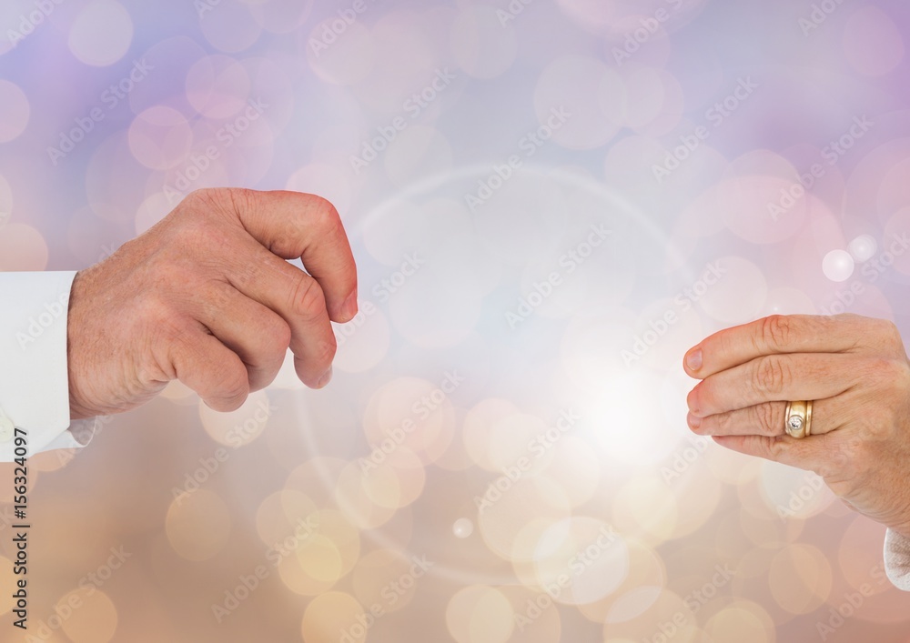 Poster old couple hands reaching with sparkling light bokeh background