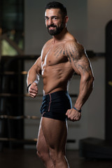 Fototapeta na wymiar Portrait Of A Physically Fit Muscular Man