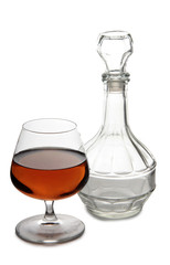 Glass with brandy and cognac on white background