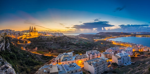 Il-Mellieha, Malta - Beautiful panoramic skyline view of Mellieha town at blue hour with Paris...