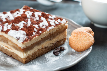 Tiramisu cake decorated with the words Happy Birthday