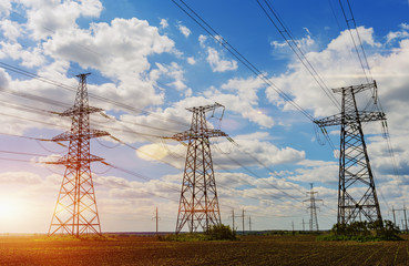 silhouette of high voltage electrical pole structure.