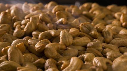 tradition cashew nut burned from stove charcoal with hot smoke.