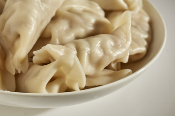 A bowl of typical Chinese pork dumplings