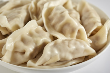 A bowl of typical Chinese pork dumplings