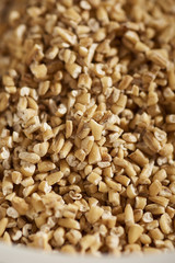 uncooked pinhead oats, also called steel cut oats