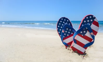 Patriotic USA background on the sandy beach © ellensmile