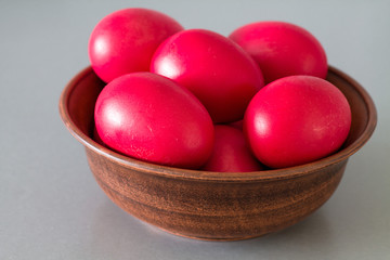 Ceramic bowl with red Easter eggs