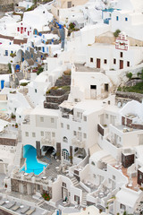 Vertical photo of Santorini buildings