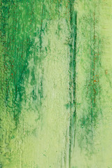 aged wooden plank with decayed green paint texture