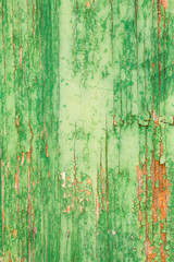 aged wooden plank with decayed green paint texture