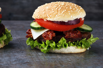fresh tasty burger on grey background