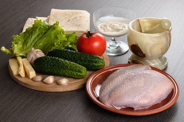 Shaurma ingredients composition on wooden background