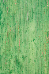 aged wooden plank with decayed green paint texture