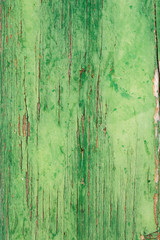 aged wooden plank with decayed green paint texture