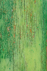 aged wooden plank with decayed green paint texture