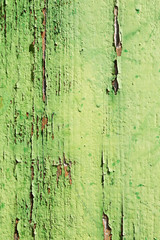 aged wooden plank with decayed green paint texture