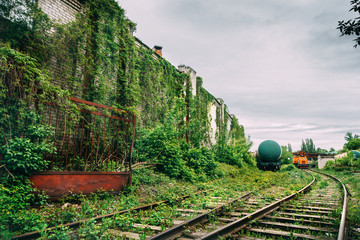 Old industrial railroad station platform, post apocalypse urbex concept