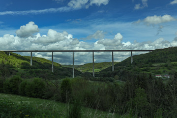 Fototapeta na wymiar Large Bridge Spanning over a Valley in Europe