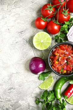 Ingredients for making tomato salsa (salsa roja).Top view with copy space.