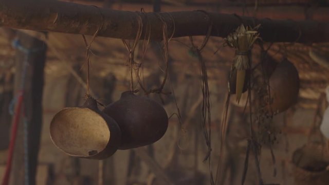 indigenous Dry Gourd hanging in a wooden trunk