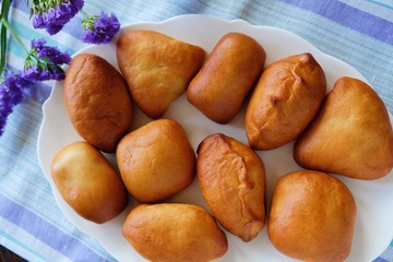 Delicious fresh hotcakes and lavender flowers on a napkin 