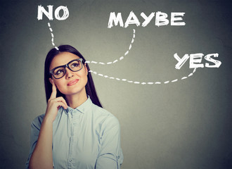 woman thinking making a choice has doubts
