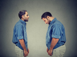 Slim guy looking at fat man himself. Diet choice right nutrition concept