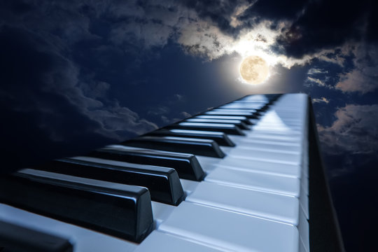 piano keys in moonlight
