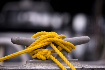 Yellow mooring rope on the hook