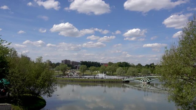 Pond in the park. Bridge view. Sredniy Tsaritsynskiy prud. Tsaritsyno Park, Moscow, Russia. 4k rela time video