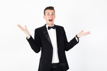 Young man master performing on the stage. Man in blue suit on white background with copy space