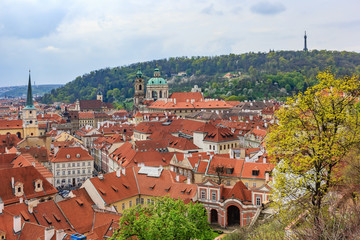 Fototapeta premium Scenic summer aerial view of the Old Town pier architecture and traditional red roofs in Prague, Czech Republic
