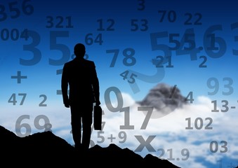 businessman silhouette on the top mountain