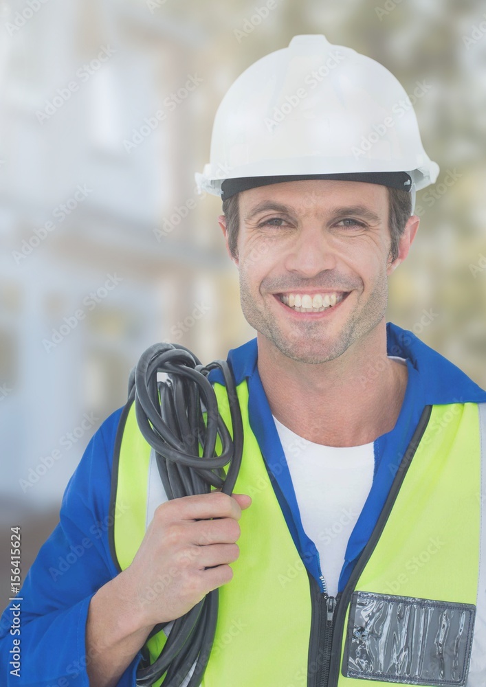 Poster Electrician with wires cables on building site