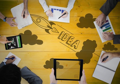 Overhead of business team with yellow wood 