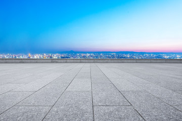 empty floor with cityscape of modern city