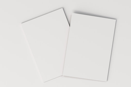 Two Blank White Closed Brochure Mock-up On White Background