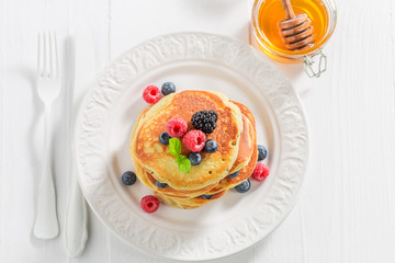 Homemade american pancakes with fresh berry fruits