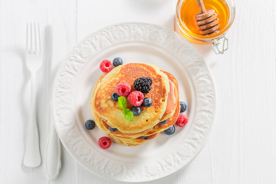 Homemade american pancakes with fresh berry fruits