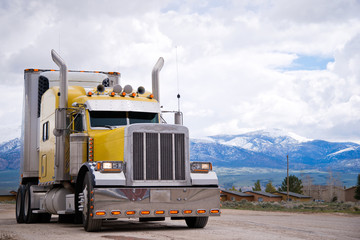 American icon of style customized yellow semi truck rig